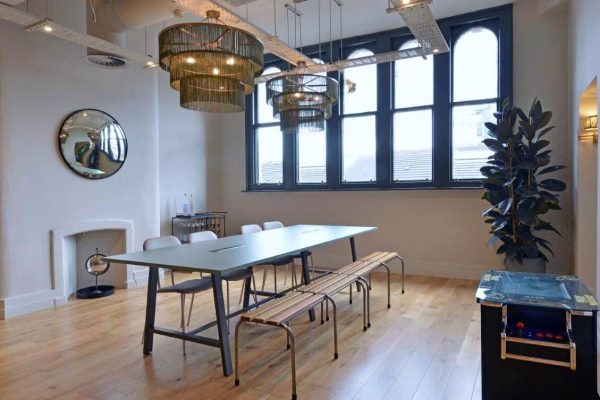 Affleck's - 4th Floor conference room with a sleek table surrounded by modern chairs.