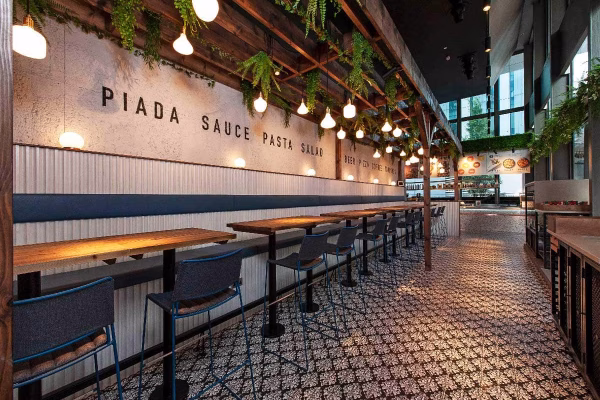 WOLF Spinningfields Restaurant interior featuring modern decor, tables and chairs